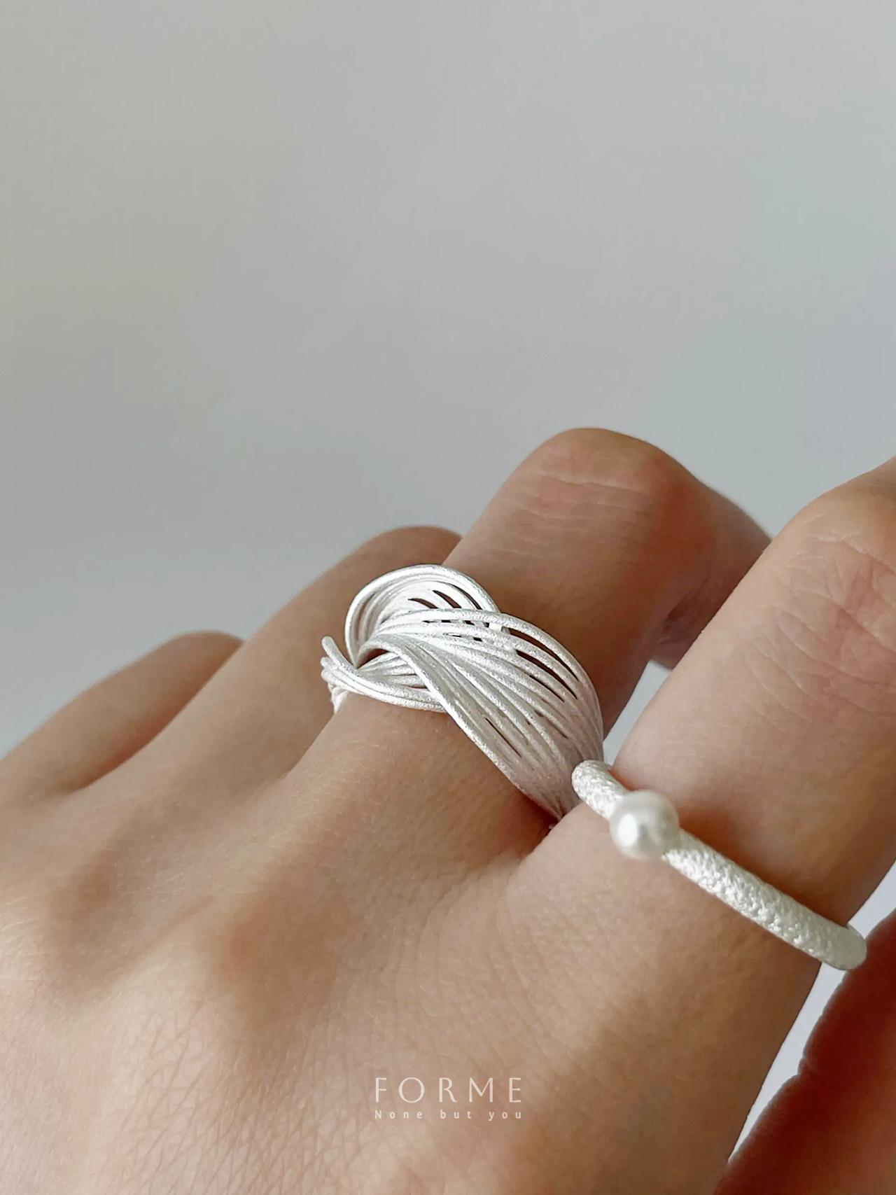Custom wave ring inspired by ocean flow and calm