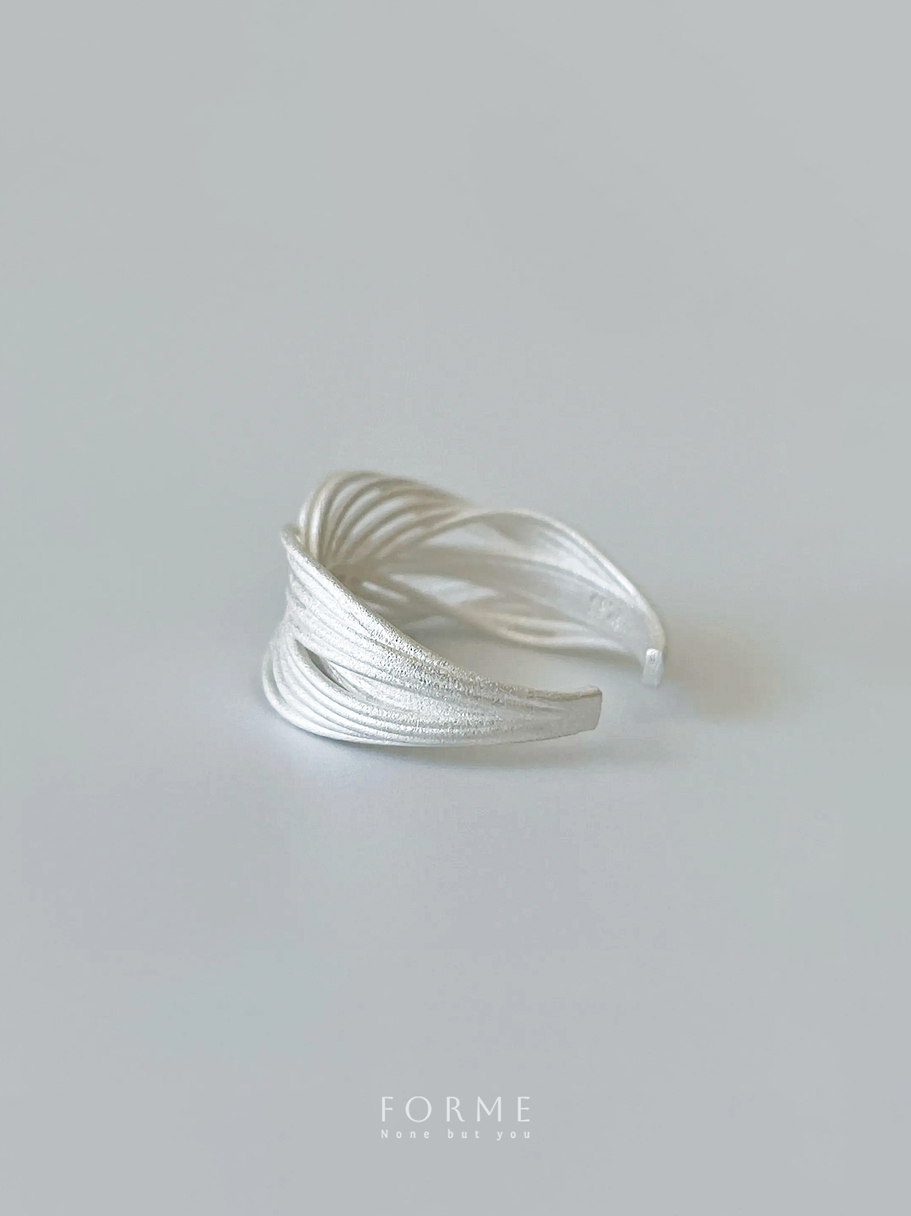Elegant sterling silver ring with natural wave lines