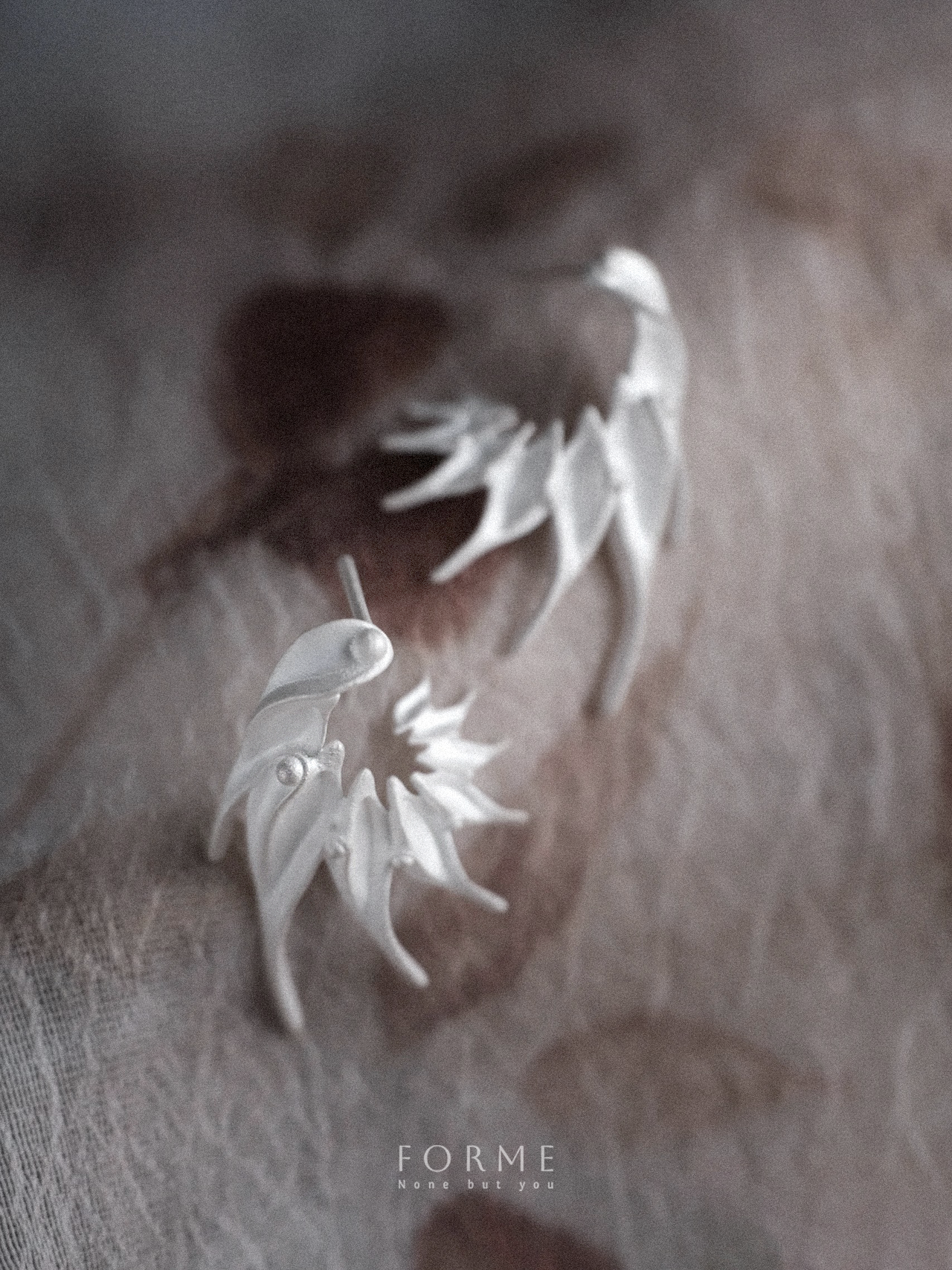 Flares Earrings – flared silver artisan earrings