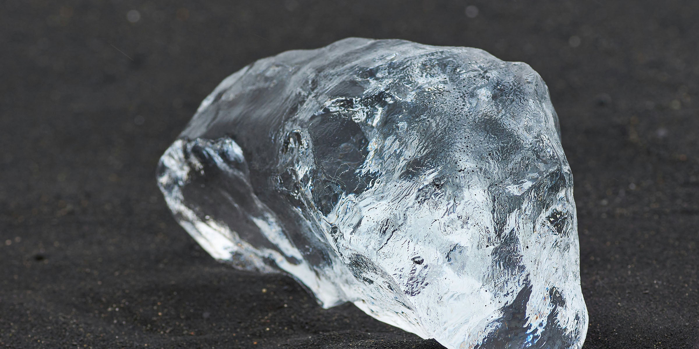 Handmade raw quartz crystal ring on a silver band with natural, uncut formation — spiritual jewelry for energy alignment and good luck