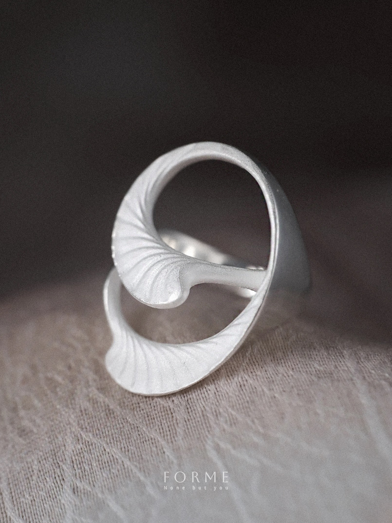 Custom sculptural ring symbolizing growth and rhythm